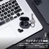 A laptop, earbuds, and keys are arranged on a desk. Anteprima dell’immagine prodotto