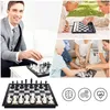 Collage of people playing chess in different settings, with a close-up of a chess set and icons representing brain, gears, and heart. Produktbild-Vorschau