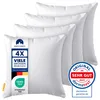 A stack of four white pillows, with a label on the front pillow. Produktbild-Vorschau