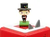 A close-up shot of a Tonies Hörfigur on a red base with shark fins. Produktbild-Vorschau