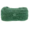 A ball of green yarn on a white background. Produktbild-Vorschau