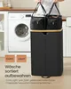 A person is holding two laundry bags above a black laundry sorter, with a washing machine in the background. Produktbild-Vorschau