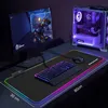 A gaming setup with a computer, monitor, keyboard, and mousepad. Produktbild-Vorschau