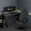 A gaming setup in a corner, featuring a desk, chair, computer, and monitor. Náhľad obrázku produktu