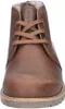 A close-up front view of a brown leather boot. Voir les images du produit