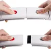 Close-up of hands connecting two parts of a white fitness hoop. Voir les images du produit