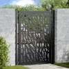 A black metal garden gate with a decorative cutout pattern, set between two white brick pillars in an outdoor setting. Podgląd zdjęcia produktu