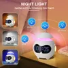 A digital alarm clock with a night light feature is displayed on a bedside table, with various lighting modes illustrated. Produktbild-Vorschau