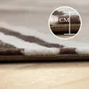 Nowoczesny dywan z dynamicznym falistym wzorem – stylowy i Podgląd zdjęcia produktu 7