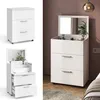 A collage of images showing a white vanity table with a mirror and drawers, both closed and open, and a lifestyle shot of the vanity in a bedroom setting. Náhľad obrázku produktu