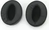 Two black ear pads for headphones are shown on a white background. Anteprima dell’immagine prodotto