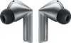 A pair of graphite-colored wireless earbuds with black ear tips, shown from the front. Produktbild-Vorschau