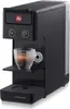 A black Illy iperespresso coffee machine with a cup of espresso on the drip tray. Voir les images du produit