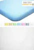 A close-up of a blue fitted sheet with a row of colored swatches below it, and a textured white background at the bottom. Produktbild-Vorschau