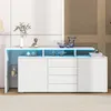 A white sideboard with LED lighting and decorative items on top, set in a modern living room. Voir les images du produit