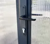 Close-up of a door handle and lock on a translucent door. Náhled obrázku produktu