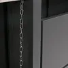A close-up view of a metal chain hanging from a dark gray structure, with a lighter gray panel to the right. Náhled obrázku produktu