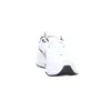 A white Nike Air Monarch IV sneaker with navy accents is shown from the front. Náhled obrázku produktu