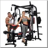 A man and a woman posing with a home gym machine. Produktbild-Vorschau