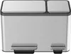 A front view of a stainless steel dual-compartment recycling bin with two foot pedals. Voir les images du produit