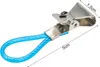A close-up shot of a metal clip with a blue loop attached, with dimensions indicated by lines and text. Anteprima dell’immagine prodotto
