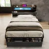 A bed with a headboard featuring LED lighting and storage, set in a modern bedroom. Anteprima dell’immagine prodotto