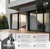 A gray awning is installed on a modern balcony with large glass doors. Náhled obrázku produktu