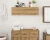 A bathroom vanity with a wooden finish, featuring a shelf above and various bathroom accessories. Náhled obrázku produktu