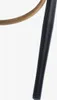 Close-up of a furniture leg and a curved metal rod. Podgląd zdjęcia produktu