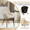 A beige upholstered chair with black metal legs, shown in a room setting with a desk and artwork. Inset images highlight the chair's frame and weight capacity. Produktbild-Vorschau