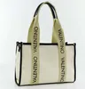 A Valentino Bags Shopper Candle Beige 26 bag is shown against a white background. Anteprima dell’immagine prodotto