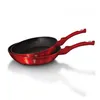 Two red frying pans stacked on top of each other against a white background. Podgląd zdjęcia produktu