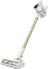 A cordless vacuum cleaner with a gold-colored rod and white body is shown against a white background. Podgląd zdjęcia produktu