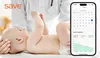 A doctor is examining a baby, with a smartphone displaying a temperature chart in the foreground. Voir les images du produit