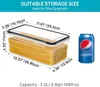 A clear plastic food storage container filled with spaghetti, shown next to a can of soda. Dimensions and capacity are indicated with text overlays. Produktbild-Vorschau