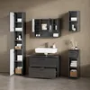 A bathroom vanity set with a sink, cabinets, and storage units against a textured wall. Anteprima dell’immagine prodotto