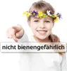 A young girl wearing a flower crown points at the viewer, with a text overlay. Produktbild-Vorschau