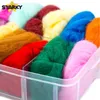 A close-up shot of a variety of colorful wool roving in a clear plastic organizer. Produktbild-Vorschau