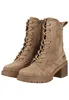 A pair of beige suede lace-up boots with a block heel, shown from a slightly angled front view against a white background. Produktbild-Vorschau