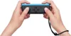 Hands holding a Nintendo Joy-Con controller. Produktbild-Vorschau