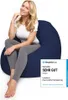 A woman is sitting on a navy blue beanbag chair. Anteprima dell’immagine prodotto
