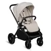 A studio shot of a baby stroller on a white background. Voir les images du produit