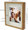 A framed picture with a family photo inside, showcasing the frame's dimensions and features. Produktbild-Vorschau