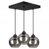 A black pendant light fixture with three smoked glass globes hanging from a rectangular base. Produktbild-Vorschau