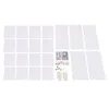 A flat lay of white panels and accessories, likely for a modular storage or display system. Náhled obrázku produktu