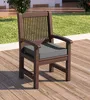 An outdoor setting with a wooden chair on a deck. Produktbild-Vorschau