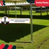 A tent structure set up on a grassy field, with a close-up of a metal pole and a graphic overlay. Produktbild-Vorschau
