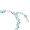 A close-up of a bracelet with blue and clear stones. Produktbild-Vorschau