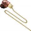A close-up product shot of a gold beaded chain pull switch with a clear red and black housing. Podgląd zdjęcia produktu