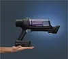 A hand holding a cordless vacuum cleaner against a gradient blue background. Náhled obrázku produktu
